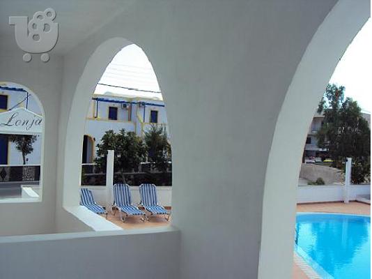 Beach hotels apartments rooms Lonja Studios Santorini Perissa Greece